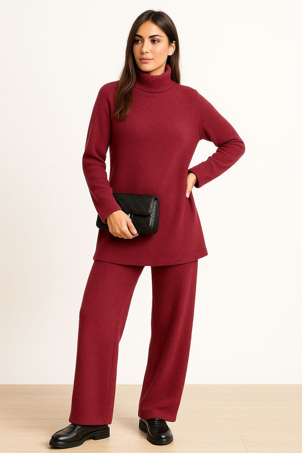 Conjunto ROMA — Dos piezas formadas por jersey de cuello vuelto y pantalón.